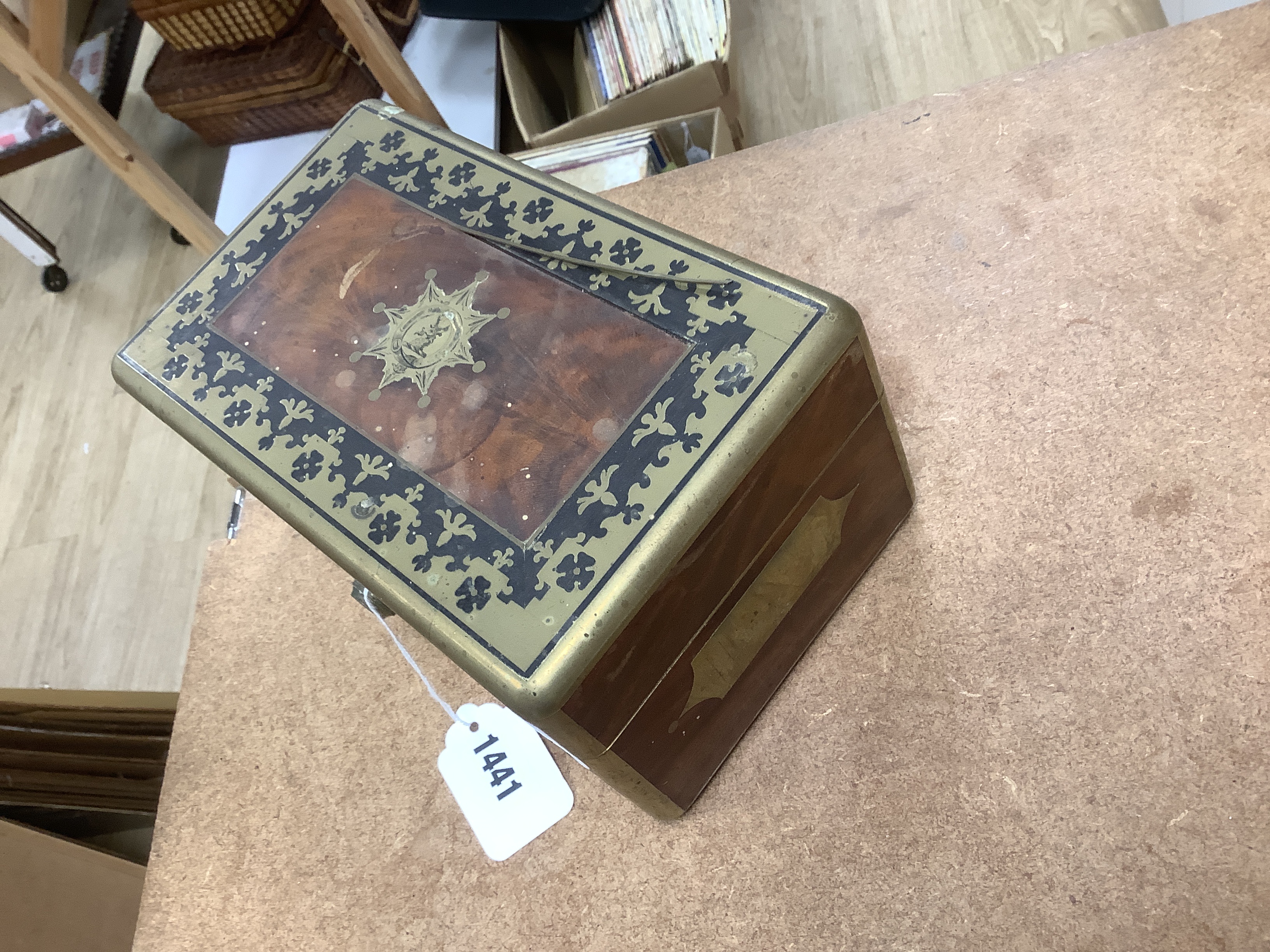 A William IV Cut brass, mahogany and ebony travelling vanity box, with silver-capped bottles, 24.5cm wide